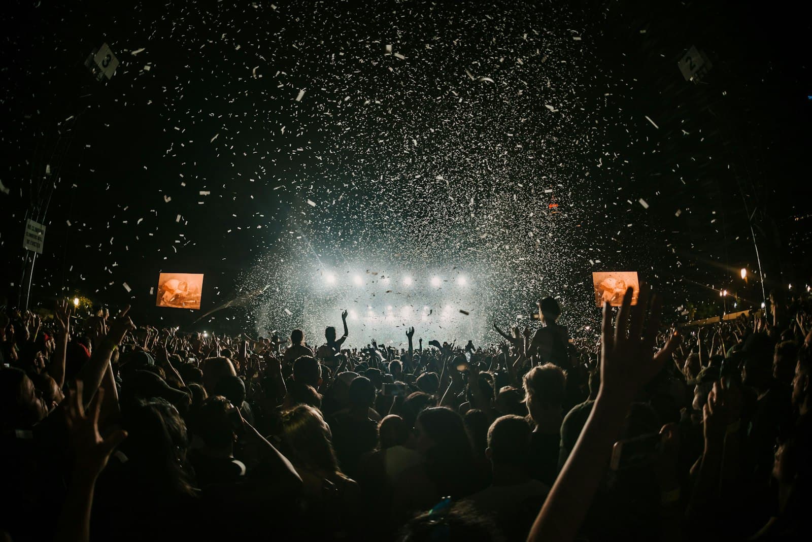 Celebration energy — confetti over a live crowd